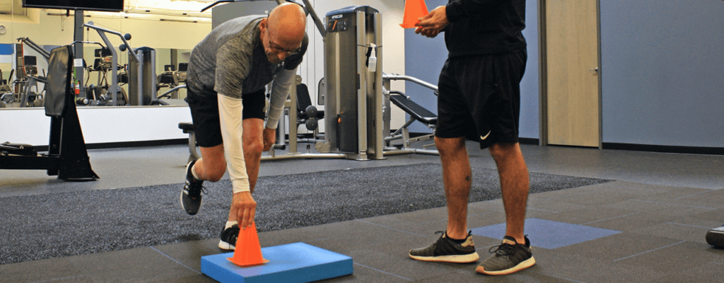 Image of patient doing drills that combine physical therapy and personal training