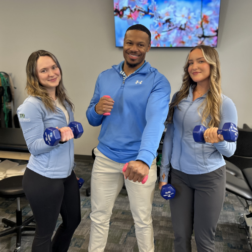 Team-photo-with-weights-the-fitness-institute-vernon-hills-chicago-il